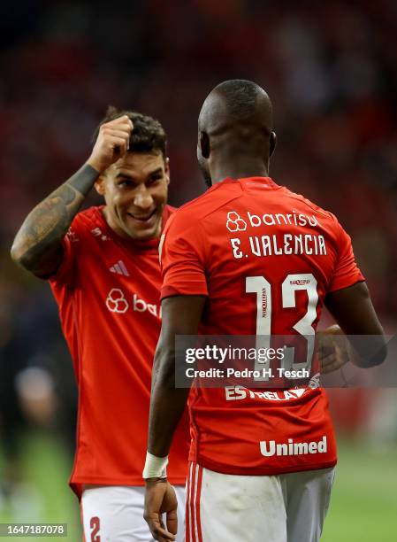 Enner Remberto Valencia of Internacional celebrates with Hugo Mallo Novegil of Internacional after scoring the first goal of their team during a...