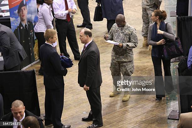 Military veterans meet potential employers at the Hiring Our Heroes job fair held on March 27, 2013 in New York City. Hundreds of veterans and their...