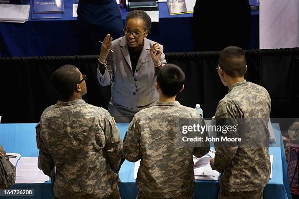 New York national guardsmen meet a potential employer at the Hiring Our Heroes job fair held on March 27, 2013 in New York City. Hundreds of veterans...