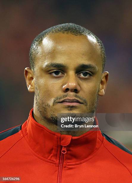 Vincent Kompany of Belgium stands for the national anthems prior to the FIFA 2014 World Cup Qualifier between Belgium and Macedonia at Stade Roi...