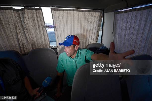 Venezuelan opposition presidential candidate, Henrique Capriles talks during a meeting with journalists in Cabimas, Zulia state, Venezuela, on March...