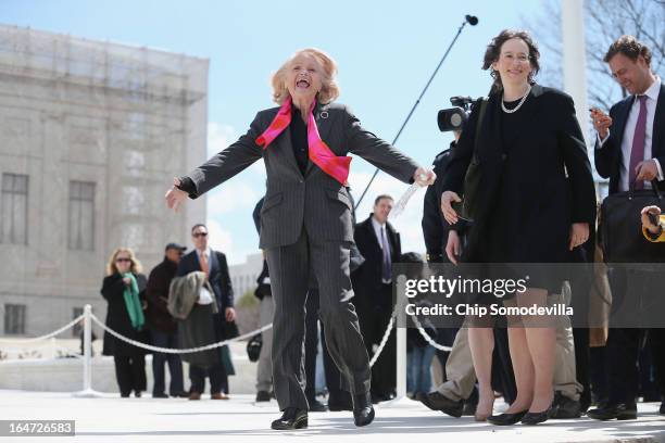 Edith Windsor acknowledges her supporters as she leaves the Supreme Court March 27, 2013 in Washington, DC. The Supreme Court heard oral arguments in...