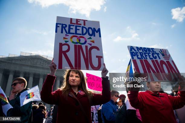 Marriage equality supporters rally in front of the Supreme Court before oral arguments in the United States v. Windsor case, which will test the...