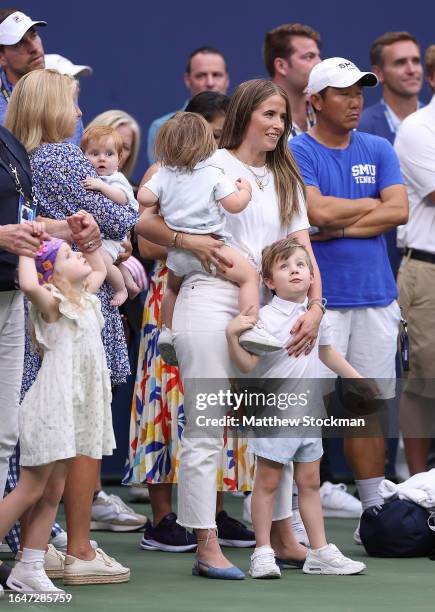 Madison McKinley, wife of John Isner, looks on during his match against Facundo Diaz Acosta of Argentina during their Men's Singles First Round match...
