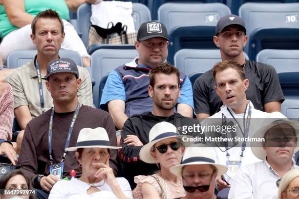 Bob Bryan and Mike Bryan look on during a Men's Singles First Round match on Day Two of the 2023 US Open at the USTA Billie Jean King National Tennis...