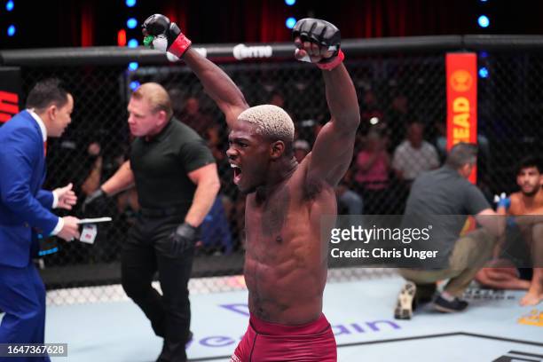 Bolaji Oki of Belgium reacts after defeating Dylan Salvador of France in their lightweight fight during Dana White's Contender Series season seven,...