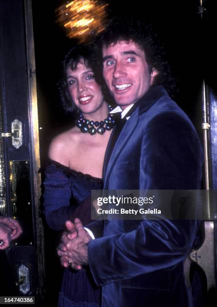 Actor Jim Dale and Julia Schafler attend the opening party for "Barnum" on February 14, 1982 at the Brown Derby in Hollywood, California.