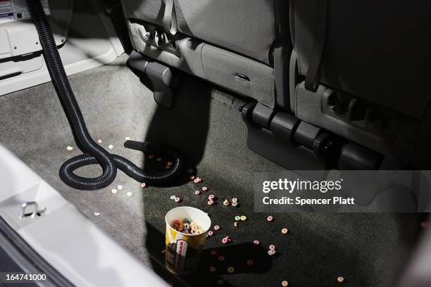 The new Honda 2014 Odyssey minivan, equipped with a built-in vacuum cleaner, is displayed at the 2013 New York International Auto Show on March 27,...