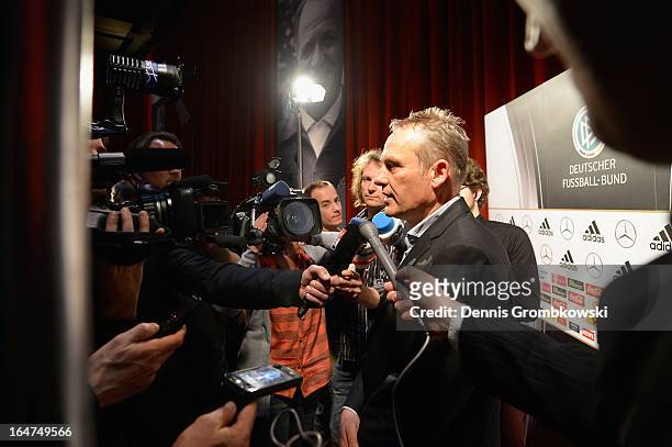 Christian Streich reacts during the Coaching and Technichal Development Course Awarding Ceremony on March 27, 2013 in Bonn, Germany.