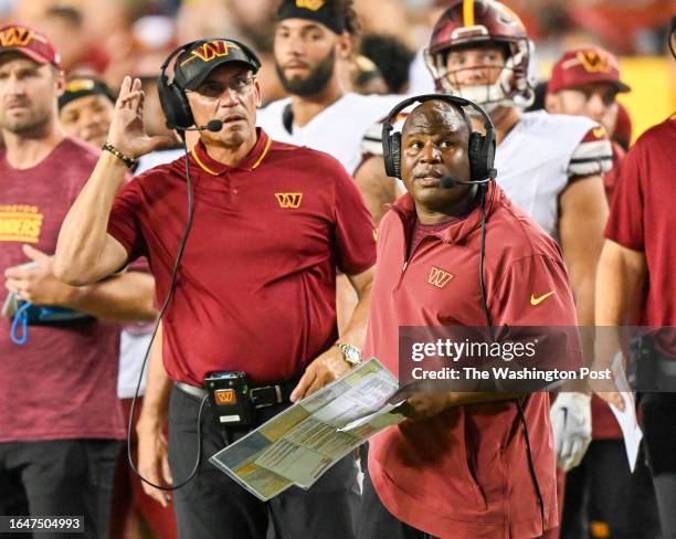 Washington Commanders offensive coordinator Eric Bieniemy and head coach Ron Rivera during preseason action against the Cincinnati Bengals at FedEx...