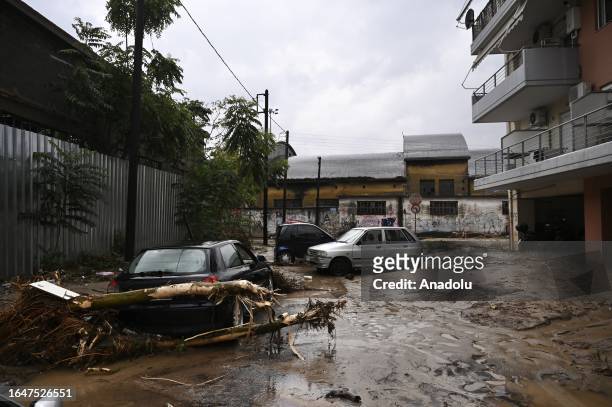 Cars are damaged after the street is flooded during a heavy rain in Volos, Greece on September 6, 2023.