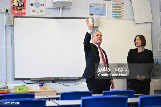Labour Party leader Sir Keir Starmer and Shadow Education Secretary, Bridget Phillipson are shown around an unaffected, but similar style classroom,...