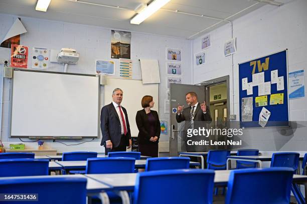Labour Party leader Sir Keir Starmer and Shadow Education Secretary, Bridget Phillipson are shown around an unaffected, but similar style RAAC...