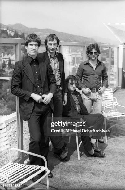 Guitarist Wilko Johnson, singer Lee Brilleaux, drummer John 'The Big Figure' Martin and bassist John B. Sparks of the English R&B group Dr. Feelgood...