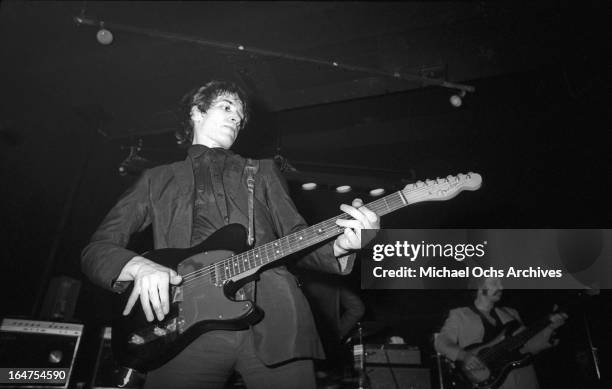 Guitarist Wilko Johnson and bassist John B Sparks of the English R&B group Dr. Feelgood perform on March 23, 1976 in Los Angeles, California.