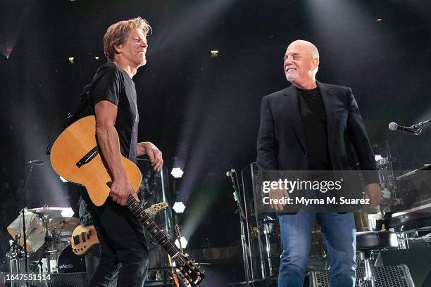 Special guest Kevin Bacon performs with Billy Joel at Madison Square Garden on August 29, 2023 in New York City.
