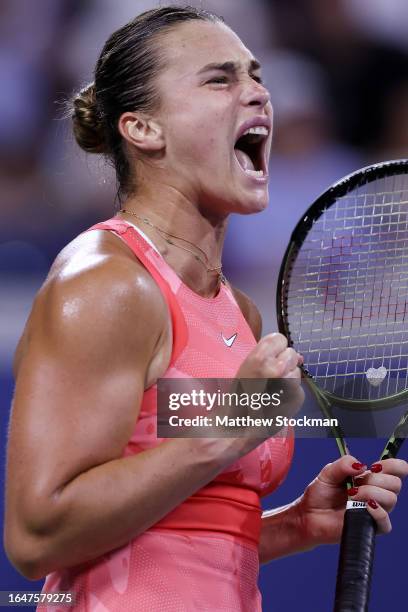 Aryna Sabalenka of Belarus celebrates a point against Maryna Zanevska of Belgium during their Women's Singles First Round match on Day Two of the...