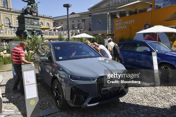 IX1 electric vehicle at the BMW AG pavilion in the Open Space area during the Munich Motor Show in Munich, Germany, on Tuesday, Sept. 5, 2023....