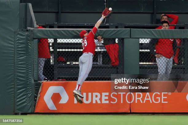 Home run ball hit by Patrick Bailey of the San Francisco Giants goes over the glove of TJ Friedl of the Cincinnati Reds in the third inning at Oracle...