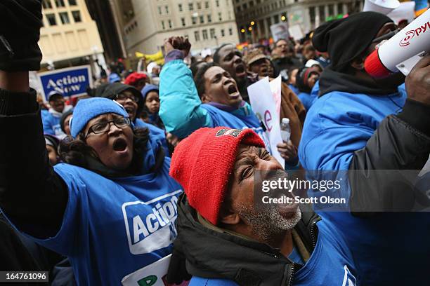 Demonstrators protest school closings on March 27, 2013 in Chicago, Illinois. More than 1,000 demonstrators held a rally and marched through downtown...