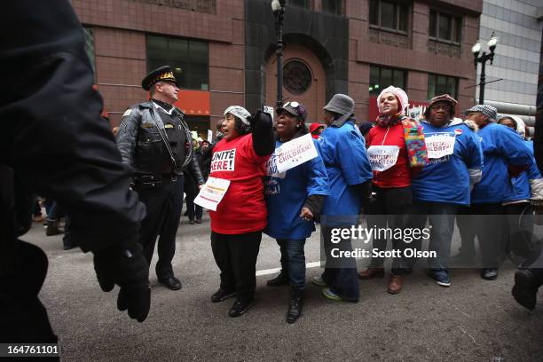 Demonstrators are arrested while protesting school closings on March 27, 2013 in Chicago, Illinois. About 50 people were cited and released after...