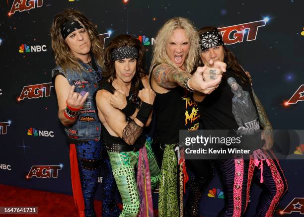 Spyder, Satchel, Michael Starr and Stix Zadinia of Steel Panther attend the red carpet for "America's Got Talent" season 18 live show at Hotel Dena...