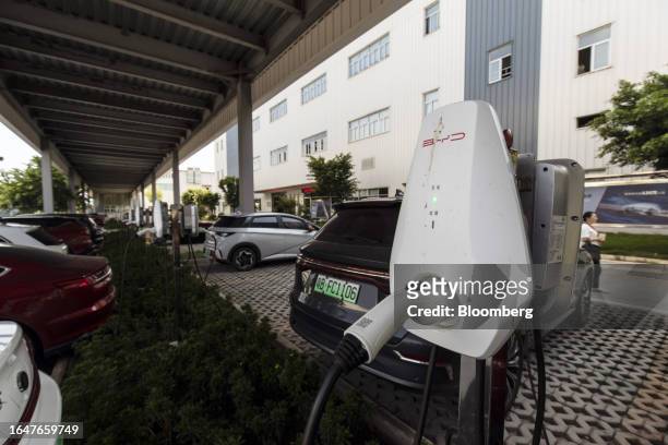 Electric vehicle charger at a BYD Co. Factory in Chongqing, China, on Tuesday, Sept. 5, 2023. Led by BYD, Chinese carmakers will almost double their...