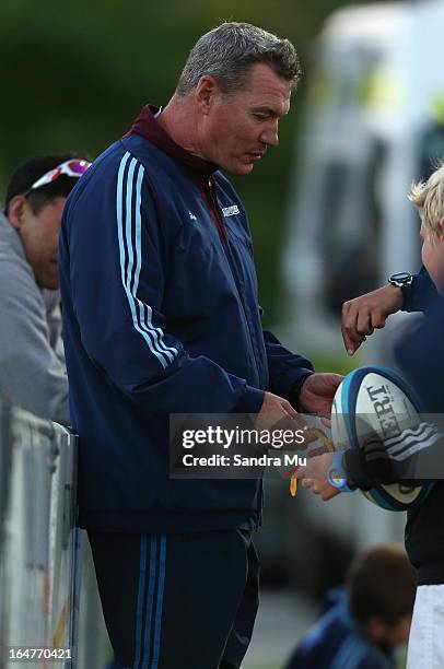 Blues Coach Sir John Kirwan talks to children during the Pacific Rugby Cup match between the Blues Development and Junior Japan at Bell Park on March...