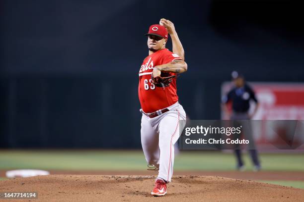 Starter Fernando Cruz of the Cincinnati Reds throws a warm up pitch between innings of the game against the Arizona Diamondbacks at Chase Field on...