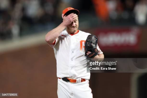 Alex Cobb of the San Francisco Giants reacts after Spencer Steer of the Cincinnati Reds broke up his no hitter attempt with two outs in the ninth...