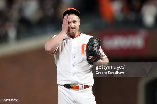 Alex Cobb of the San Francisco Giants reacts after Spencer Steer of the Cincinnati Reds broke up his no hitter attempt with two outs in the ninth...