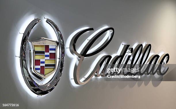 The General Motors Co. Cadillac logo is displayed during the press day of the Seoul Motor Show in Goyang, South Korea, on Thursday, March 28, 2013....