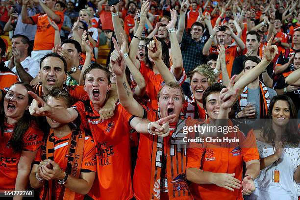 Roar fans celebrate winning the round 27 A-League match between the Brisbane Roar and Sydney FC at Suncorp Stadium on March 28, 2013 in Brisbane,...