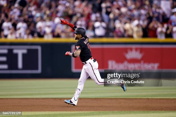 Ketel Marte of the Arizona Diamondbacks runs the bases after hitting a three run home run during the fifth inning of the game against the Cincinnati...