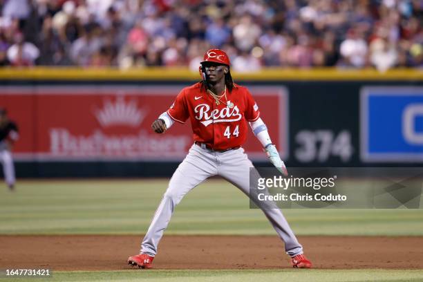 Elly De La Cruz of the Cincinnati Reds leads off second base during the game against the Arizona Diamondbacks at Chase Field on August 26, 2023 in...
