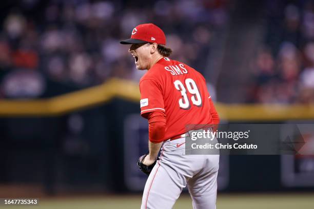 Lucas Sims of the Cincinnati Reds reacts after the Reds defeated the Arizona Diamondbacks 8-7 in 11 innings at Chase Field on August 26, 2023 in...