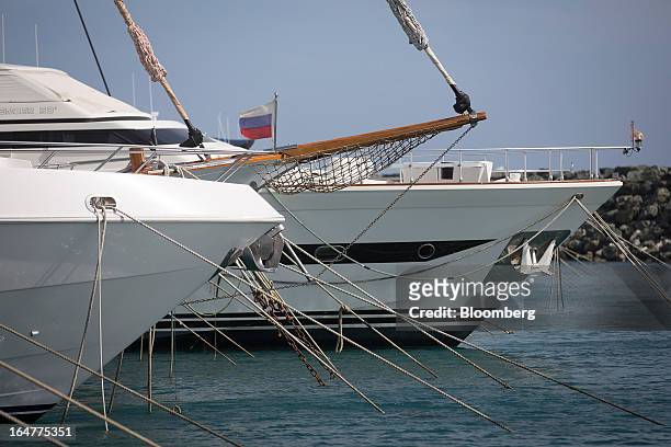 Russian flag flies from a yacht at St Raphael Dock in Limassol, Cyprus, on Wednesday, March 27, 2013. Directly or indirectly, tourism makes up a...