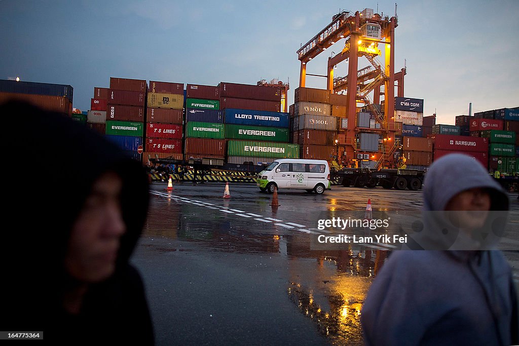 Dock Workers Stage Sit-In To Protest About Wages