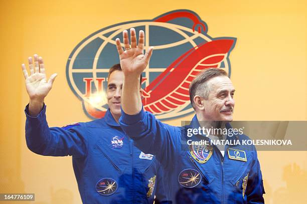 Crew members of the next expedition to the International Space Station , US astronaut Christopher Cassidy and Russian cosmonaut Pavel Vinogradov wave...