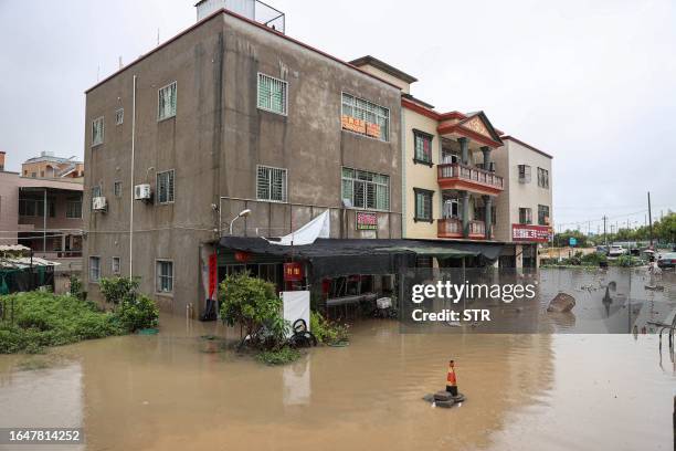 Partially submerged building is seen following heavy rains caused by Typhoon Haikui in Xiamen, in China's southern Fujian province on September 6,...