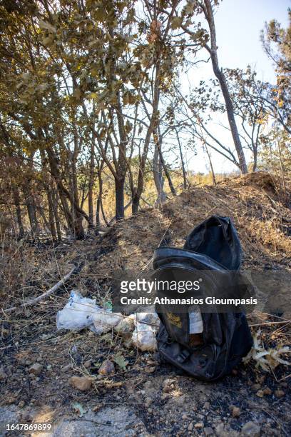 Refugees backpack lays on the ground near Lefkimi village at Dadia Lefkimi National Park on August 29, 2023 in Alexandroupoli, Greece. The European...