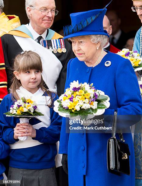 Queen Elizabeth II leaving Christs Church Cathedral in Oxford after The Royal Maundy Service on March 28, 2013 in Oxford, England.