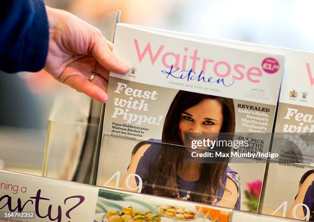 In this photo illustration the latest edition of Waitrose Kitchen Magazine, featuring Pippa Middleton on the cover, is seen by the tills in a...