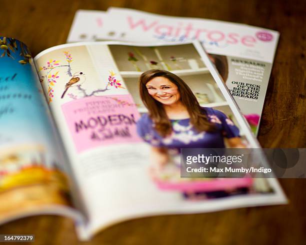 In this photo illustration the latest edition of Waitrose Kitchen Magazine featuring Pippa Middleton on the cover is pictured on March 28, 2013 in...