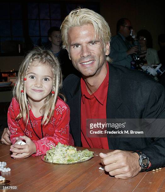 Actor Lorenzo Lamas and his daughter attend the film premiere after party of "Treasure Planet" at The Cinerama Dome on November 17, 2002 in...