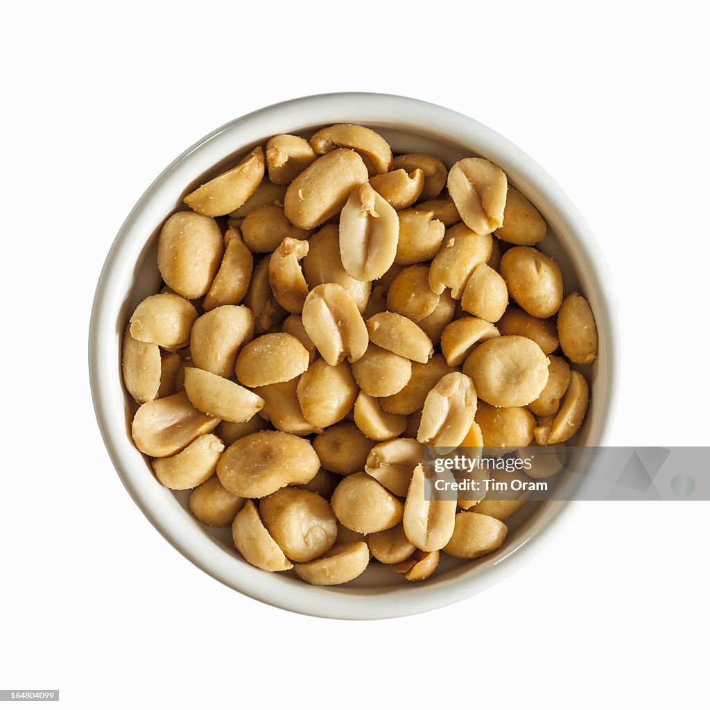 A bowl of salted peanuts