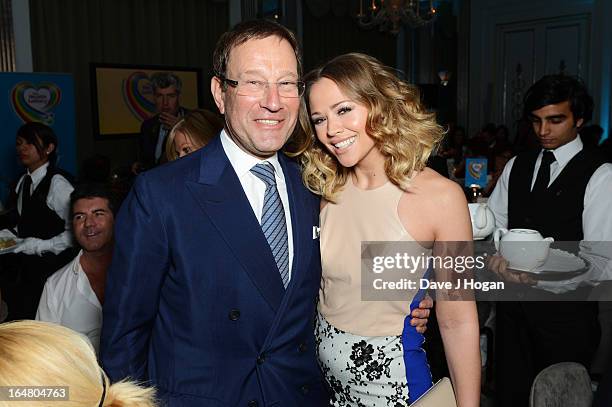 Richard Desmond and Kimberley Walsh attend the Health Lottery champagne tea at Claridges on March 28, 2013 in London, England.