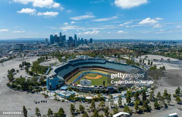 dodger stadium and los angeles city skyline aerial view - los angeles skyline stock pictures, royalty-free photos & images