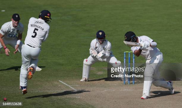 Durham's David Bedingham takes evasive action from Cheteshwar Pujara's off drive during the LV= County Championship match between Durham County...