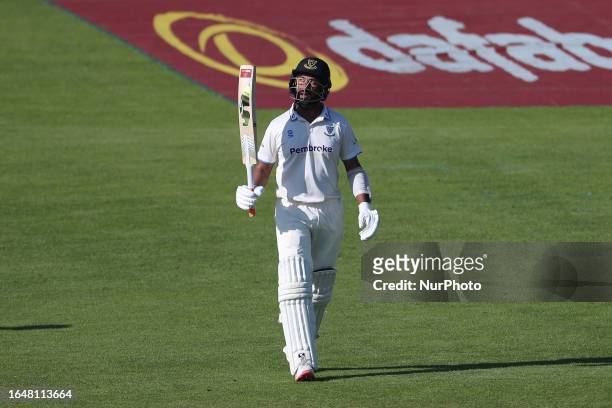 Sussex's Cheteshwar Pujara celebrates after scoring fifty during the LV= County Championship match between Durham County Cricket Club and Sussex...